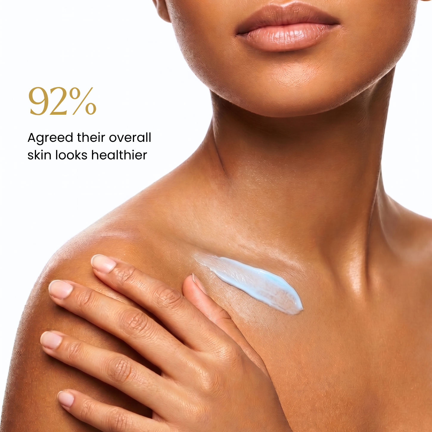 Close-up of a woman's neck, shoulder, and hand with a smear of light blue cream on her upper chest, against a white background with text reading '92% Agreed their overall skin looks healthier'.