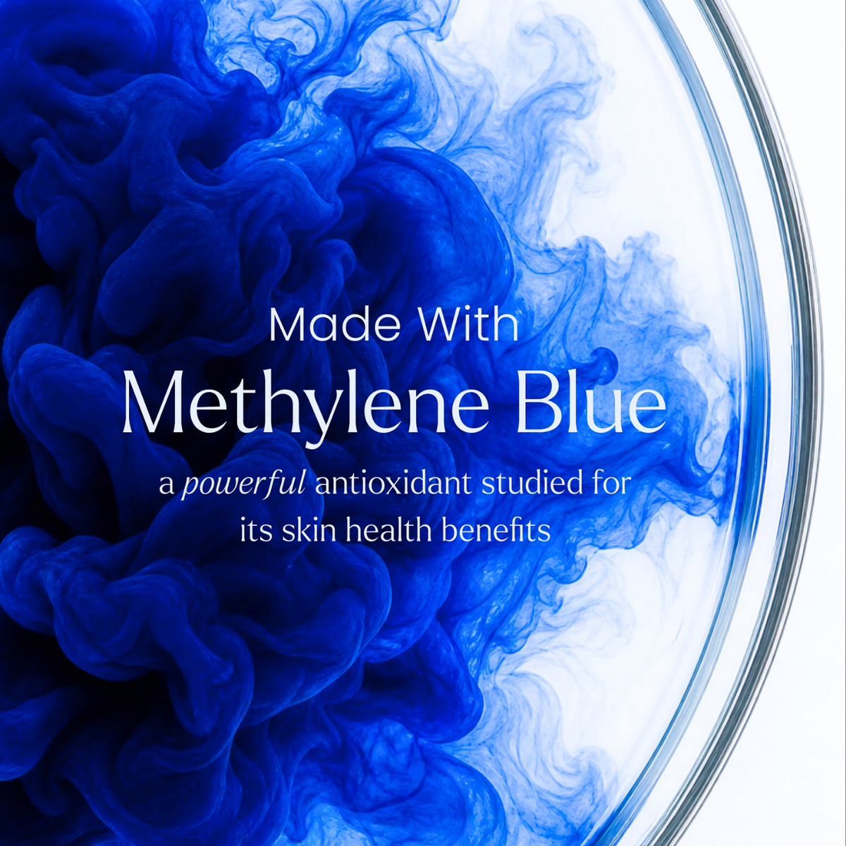 A circular glass petri dish filled with swirling blue and white methylene blue ink, with white text reading 'Made With Methylene Blue' and smaller text below about antioxidant benefits for skin health.