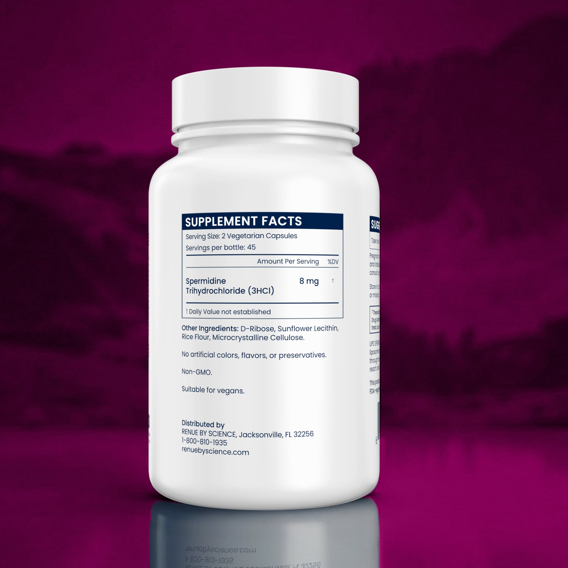 Supplement bottle with label on a purple background