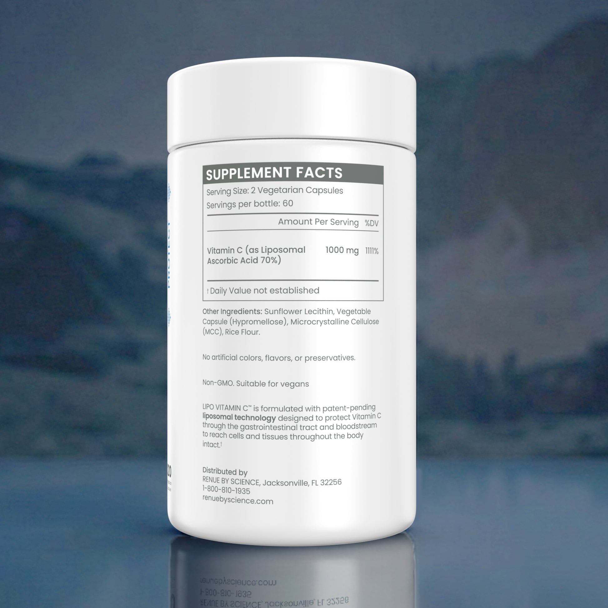 A white plastic bottle of dietary supplement capsules shown against a dark, blurred background with a reflective surface below. The label displays 'SUPPLEMENT FACTS' with details for a 2-vegetable-capsule serving size.