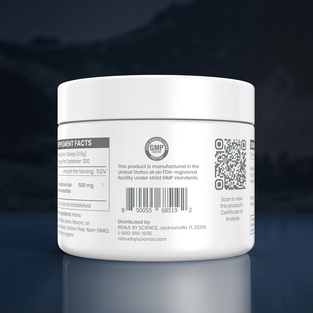 A white plastic supplement jar shown from the back, displaying the GMP seal, barcode, and QR code on a dark reflective background.