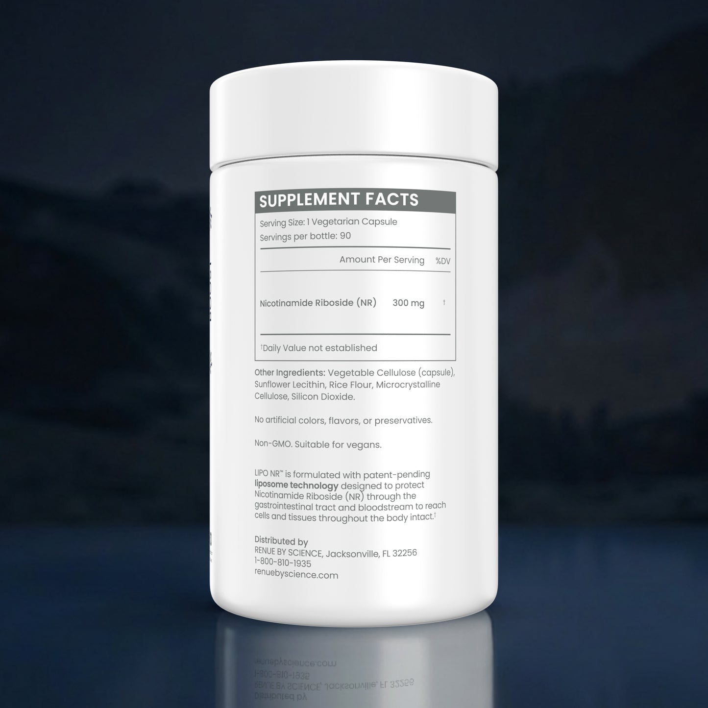 A white plastic supplement bottle with a white cap, showing the Supplement Facts label. The label text is partially obscured by a semi-transparent rectangular overlay, but the bottle is photographed on a dark blue gradient background with a soft reflection below.