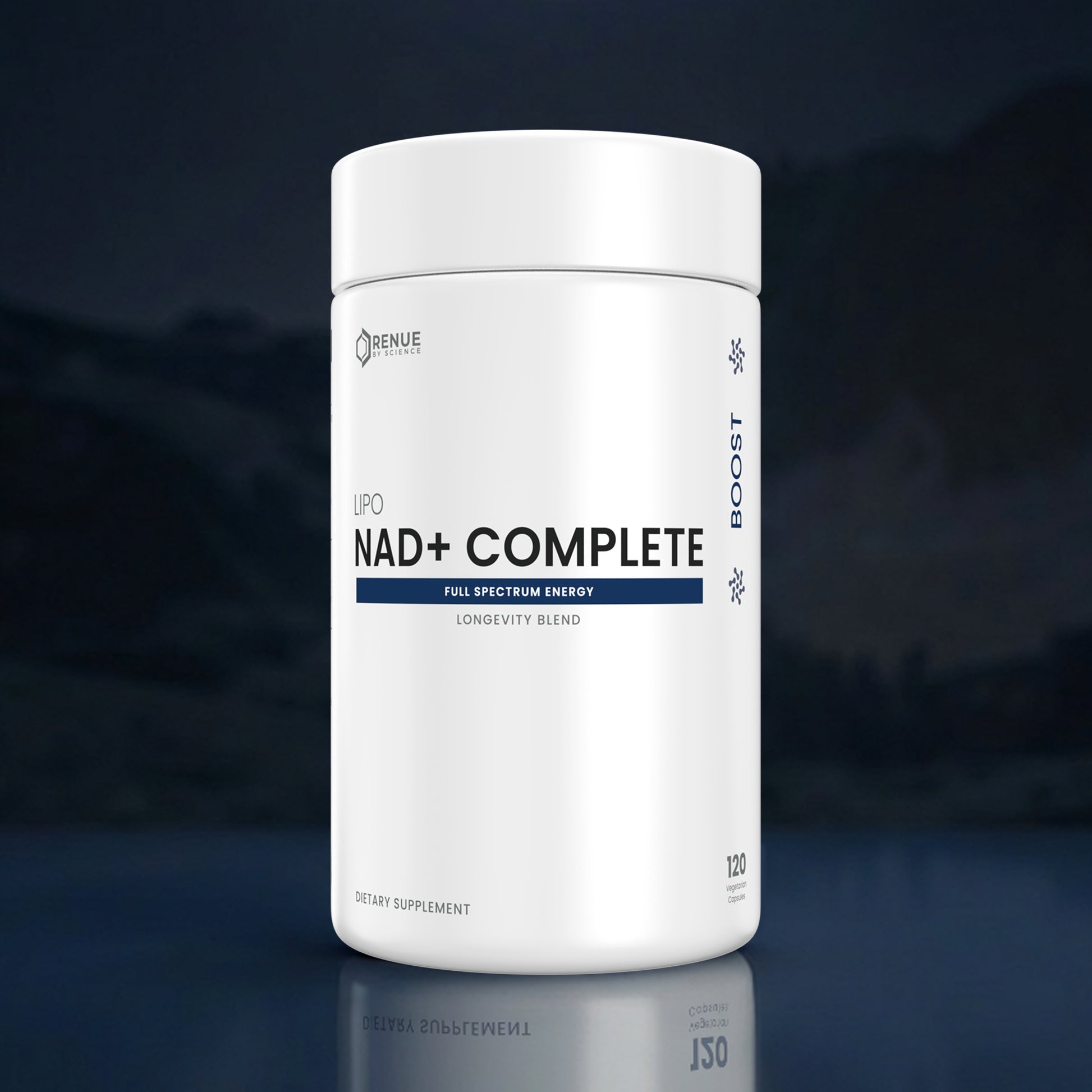 A white cylindrical supplement bottle labeled 'NAD+ COMPLETE' by Renue Labs, shown on a dark reflective studio background.