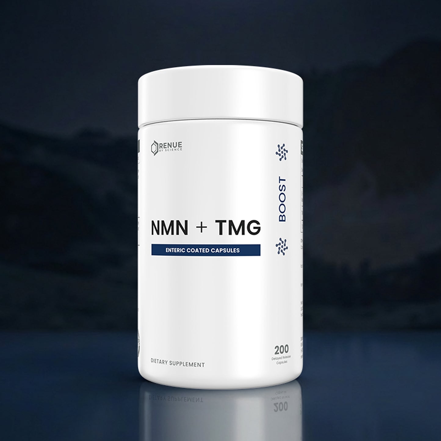 A white cylindrical supplement bottle labeled 'NMN + TMG' with 'ENERIC COATED CAPSULES' and 'BOOST' text, shown on a dark blue reflective surface against a blurred dark background.