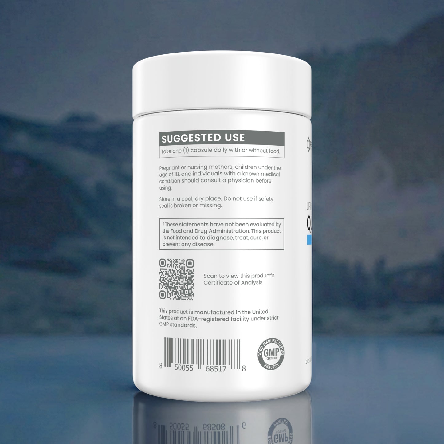 A white plastic supplement bottle shown from the back, featuring a white label with black text, a QR code, and a GMP seal, set against a dark blue reflective background.