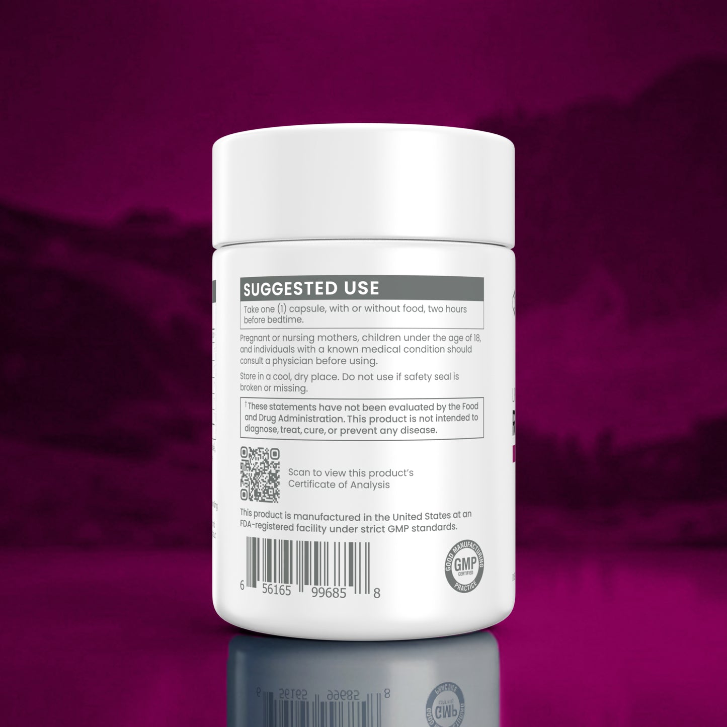 A white plastic supplement bottle shown from the back, featuring a white cap and a white label with black text detailing 'Suggested Use', a QR code, and a GMP seal. The bottle is centered against a dark magenta-purple gradient background with a soft reflection on the surface below.