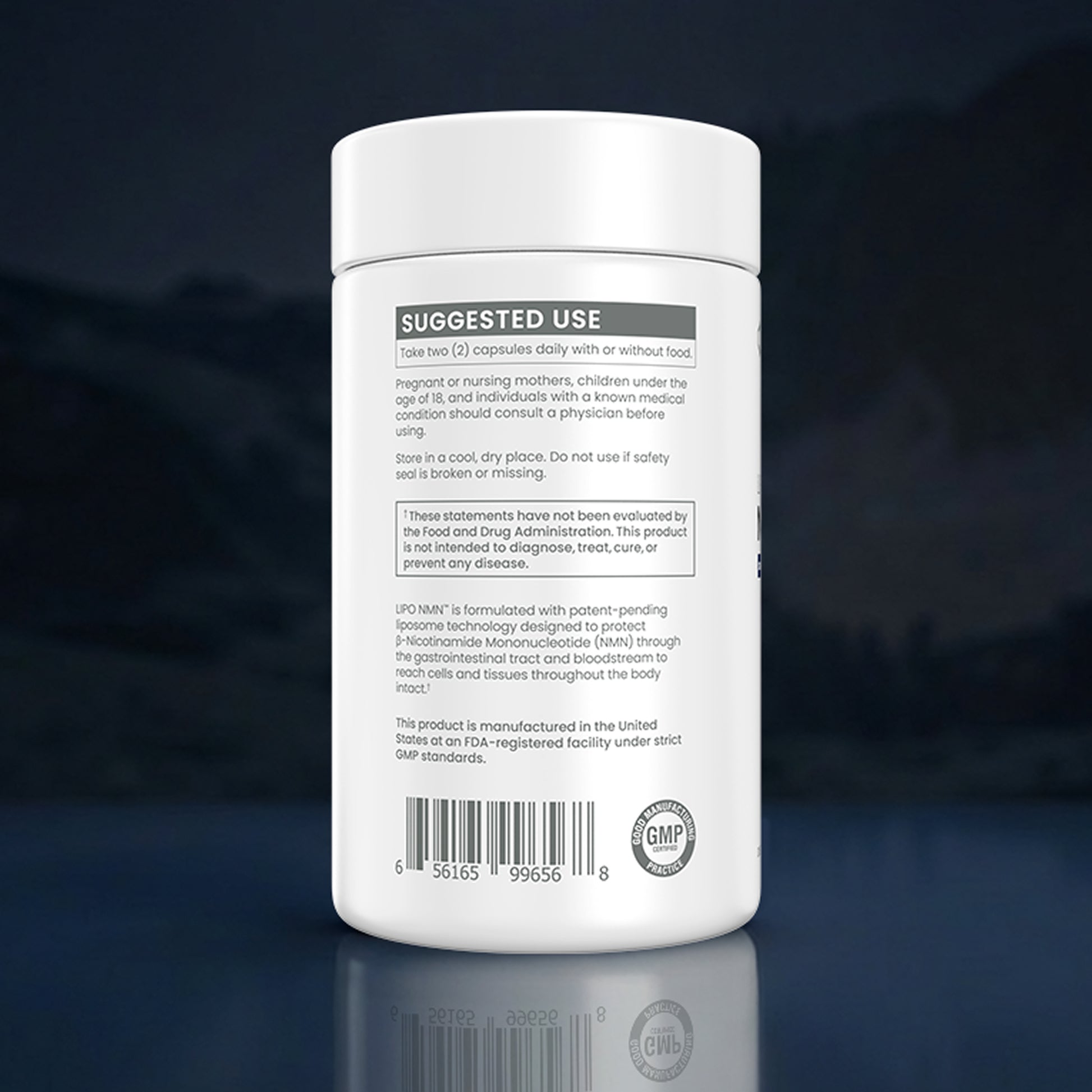 White supplement container with label on a dark background