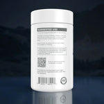 A white plastic supplement bottle shown from the back, featuring a white label with black and gray text, a QR code, and a GMP seal, set against a dark blue gradient background with a reflection below.