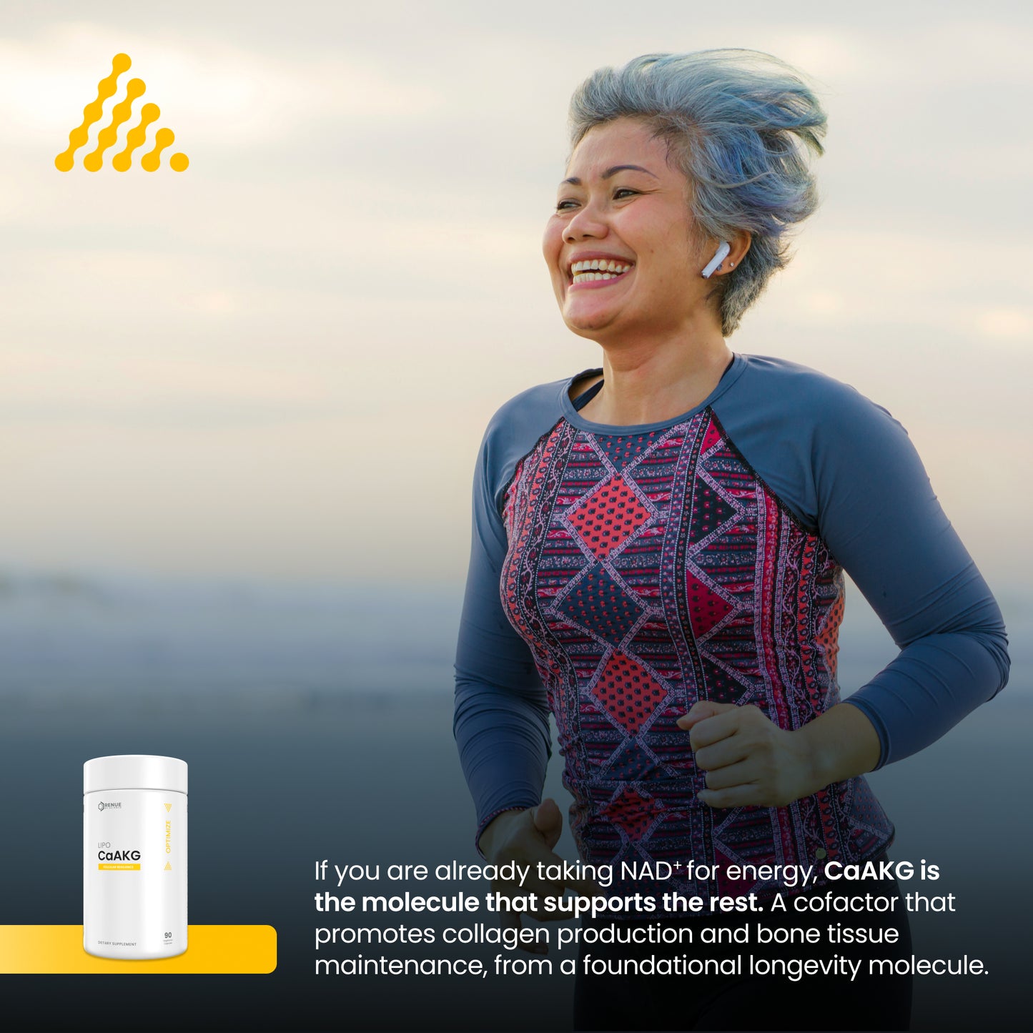 A smiling woman with blue-gray hair runs outdoors wearing a long-sleeve athletic top with a geometric red, navy, and pink pattern. A small white supplement container labeled CaAKG appears in the lower left, with marketing text on a dark band at the bottom.